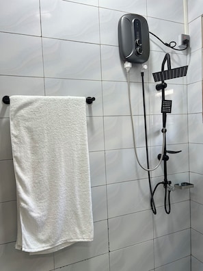 Basic Apartment, Patio | Bathroom | Shower, slippers, towels, soap - Inkingi Homestay (Kigali)