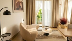 Luxury Double Room, Balcony | Living area - HMK Living Executive Apartments (Kampala)