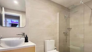 Hair dryer, towels, soap, toilet paper