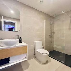Hair dryer, towels, soap, toilet paper