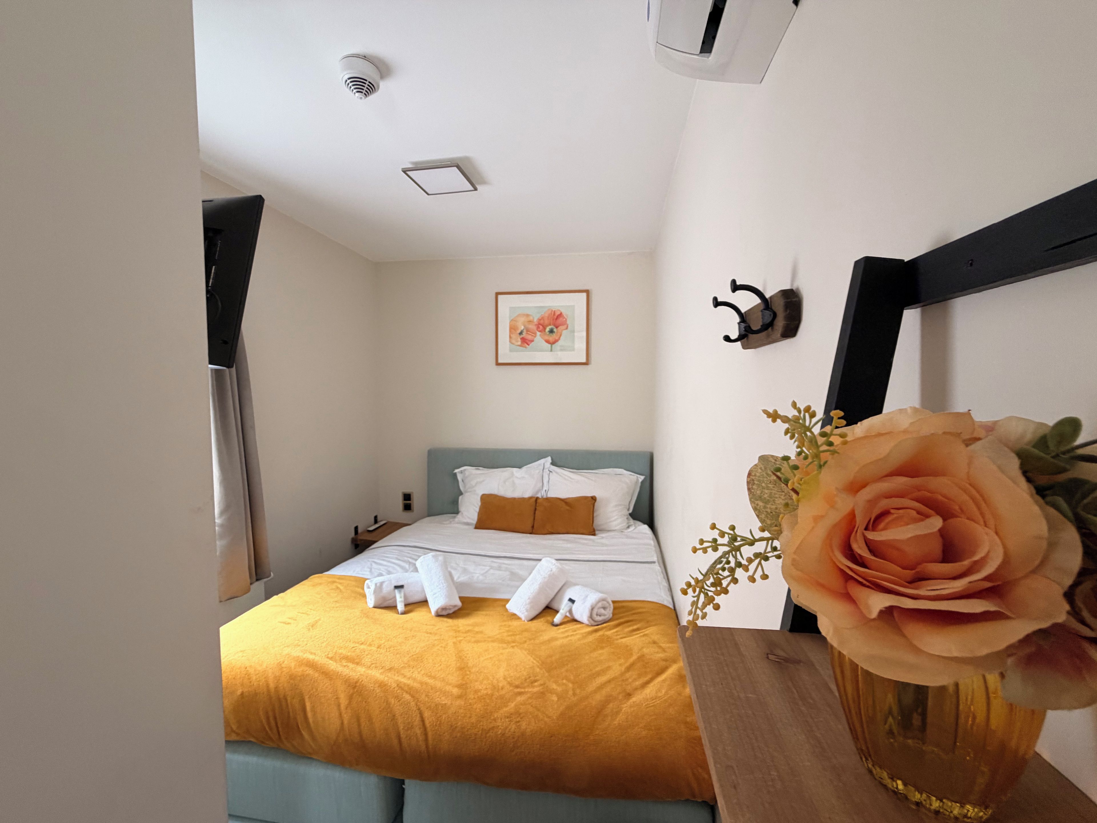 Relax and unwind in the comfortable bedroom after a day in Tilburg.