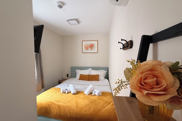 Relax and unwind in the comfortable bedroom after a day in Tilburg.