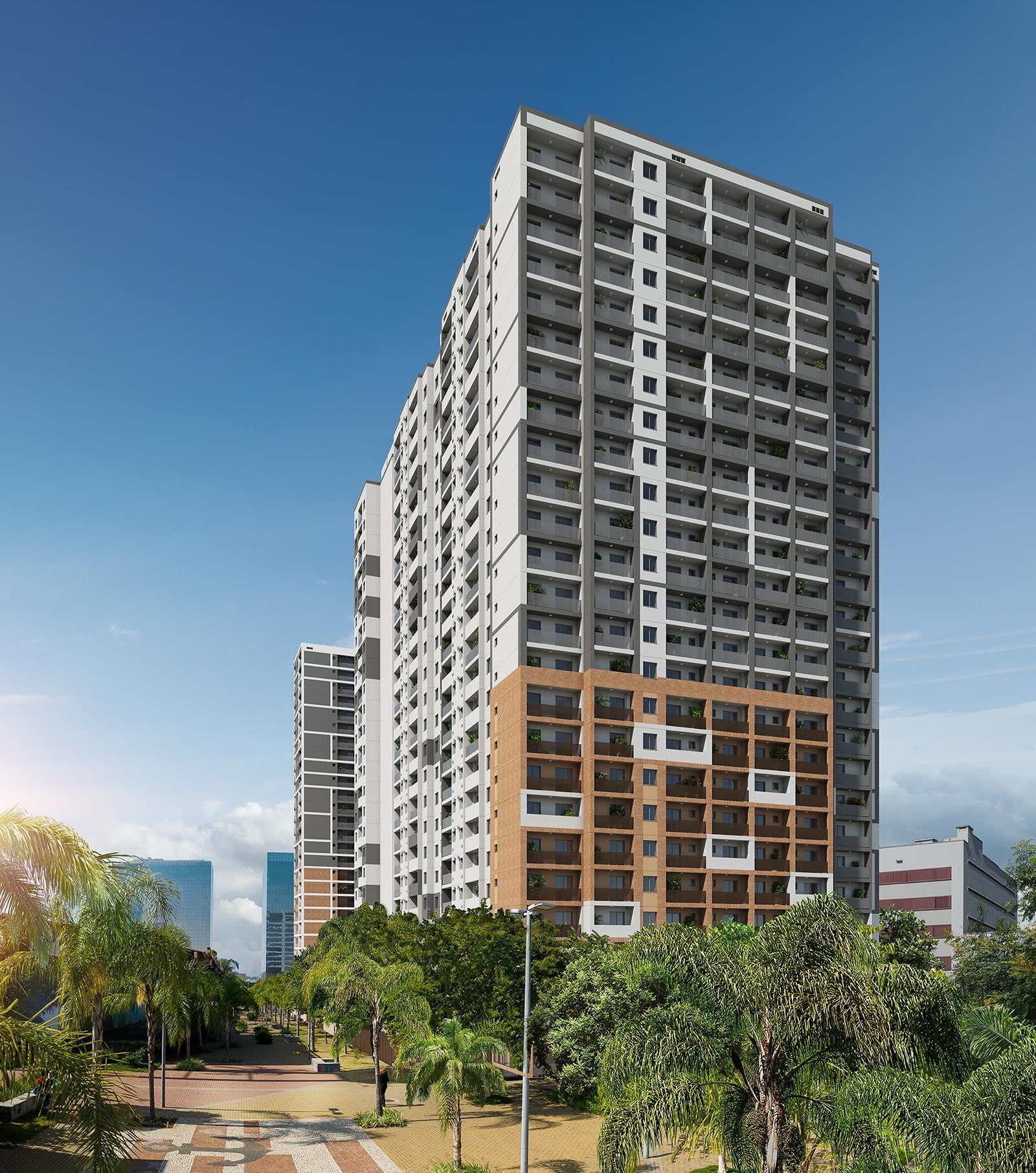 A high-rise residential building with multiple balconies, surrounded by greenery and a clear sky.