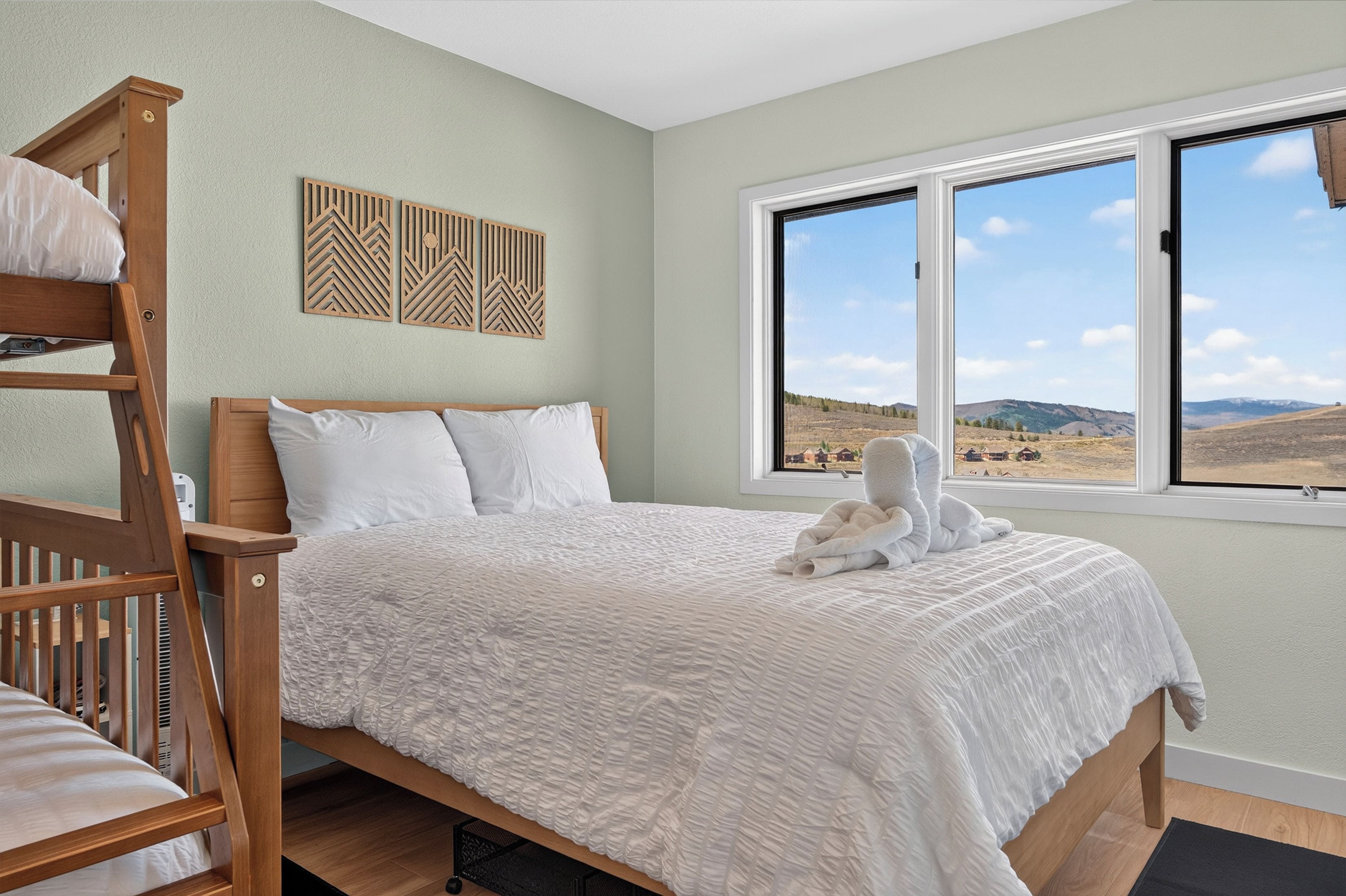 Wake to sweeping views of golden hills and open skies stretching beyond your window. Sunlight pours in to highlight the cozy comfort of your room, complete with a bunk bed for the little ones.