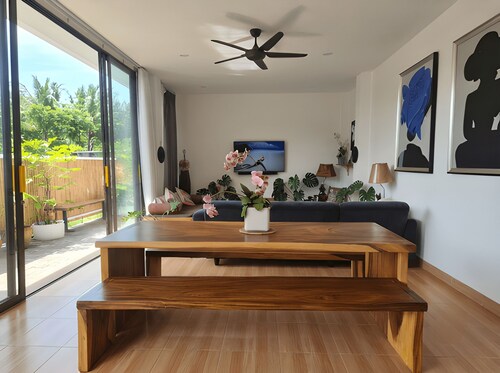 Luxury beachfront villa steps from Haad Salad Beach with shared pool access.