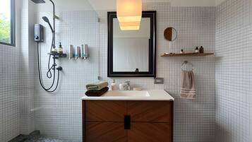 Shower, hair dryer, towels, soap