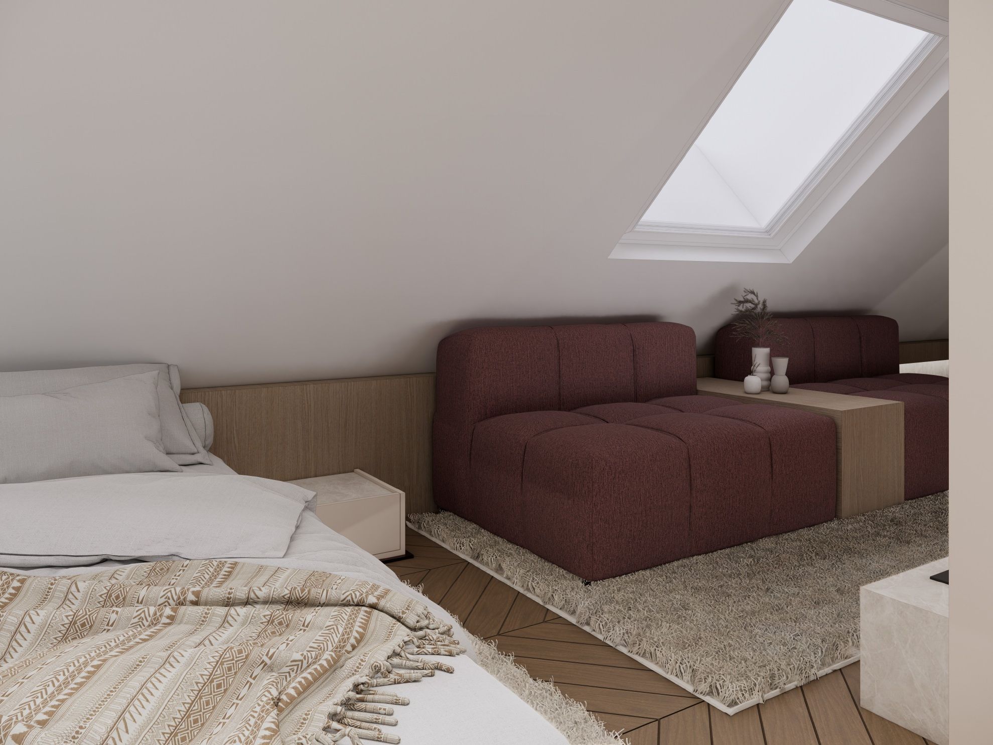 Ein Schlafzimmer mit einem Bett, einem Sofa, einem kleinen Tisch und einem Oberlicht.