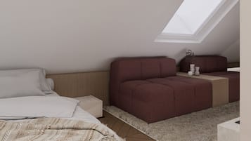 Ein Schlafzimmer mit einem Bett, einem Sofa, einem kleinen Tisch und einem Oberlicht.