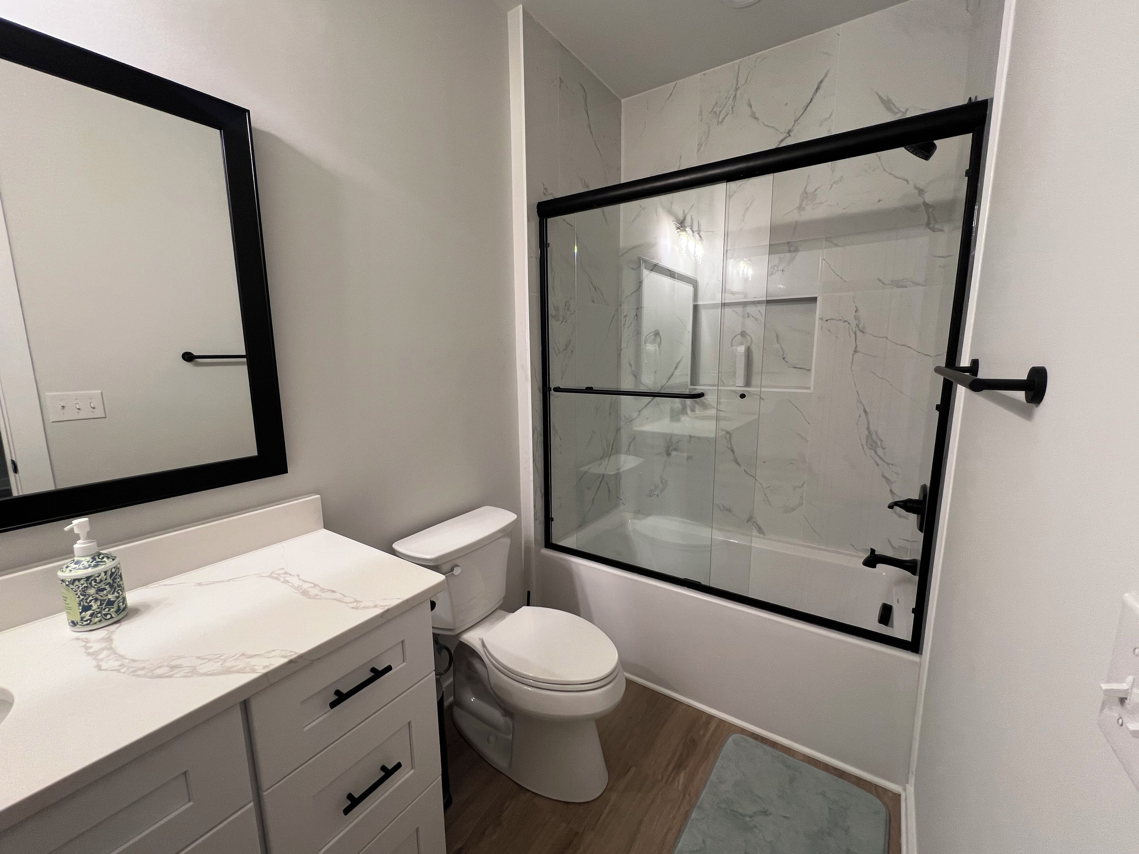 Shower, towels, soap, toilet paper