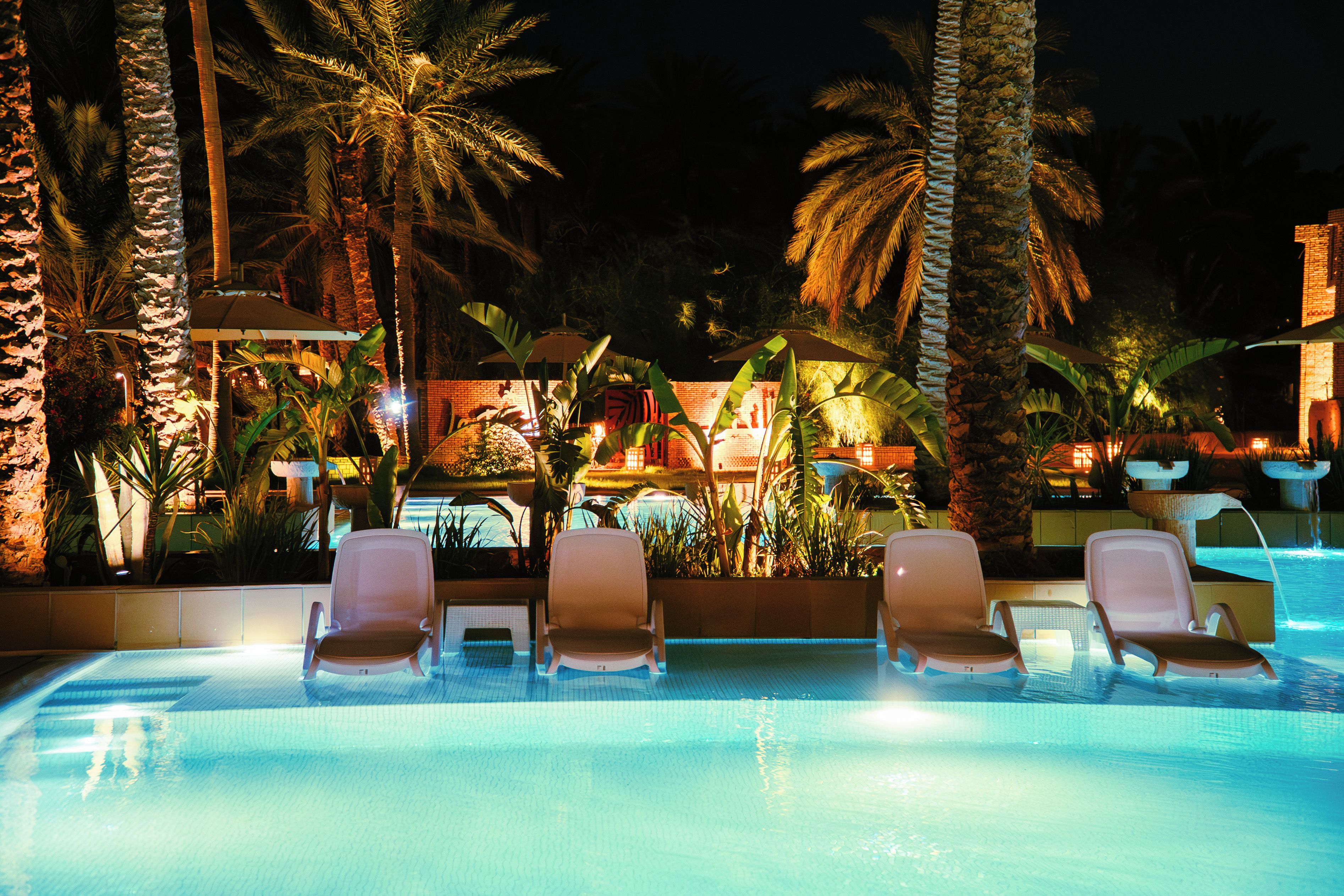 Indoor pool, outdoor pool, open 10:00 AM to 6:00 PM, pool umbrellas