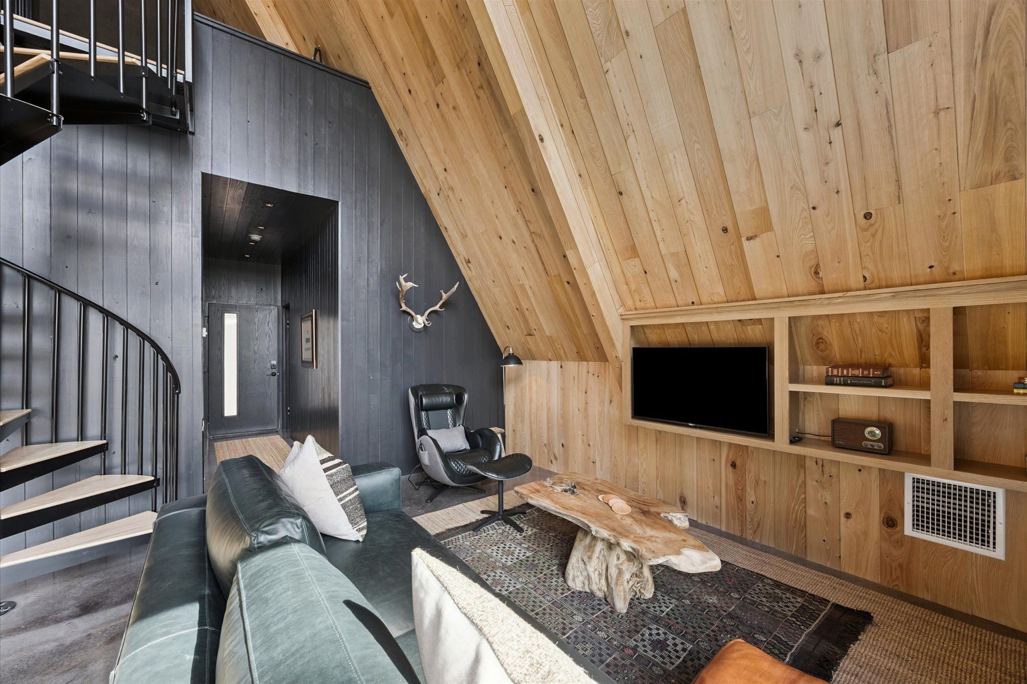Hang your hat on the rack, kick off your boots, and unwind in the Nohaus massage chair.