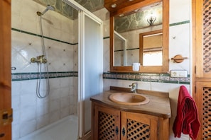 A bathroom with a shower, a sink, and a mirror. - Villa Rosafina - Three Bedroom Villa, Sleeps 6 (Frigiliana)