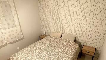 2 quartos, berço de viagem, Wi-Fi de cortesia, roupa de cama