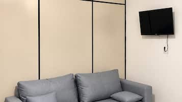 Apartamento família | Área de estar