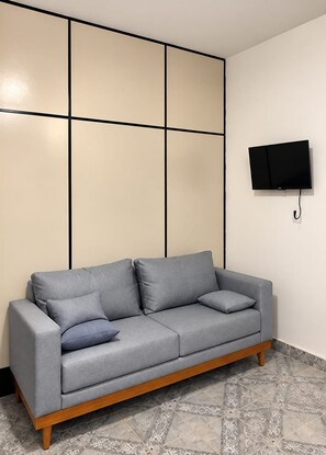 Apartamento família | Área de estar