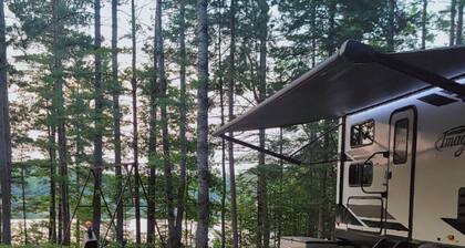 Your Private Lakeside Escape on Perry Lake, Camper Sleeps 4 with Full Hook Up.