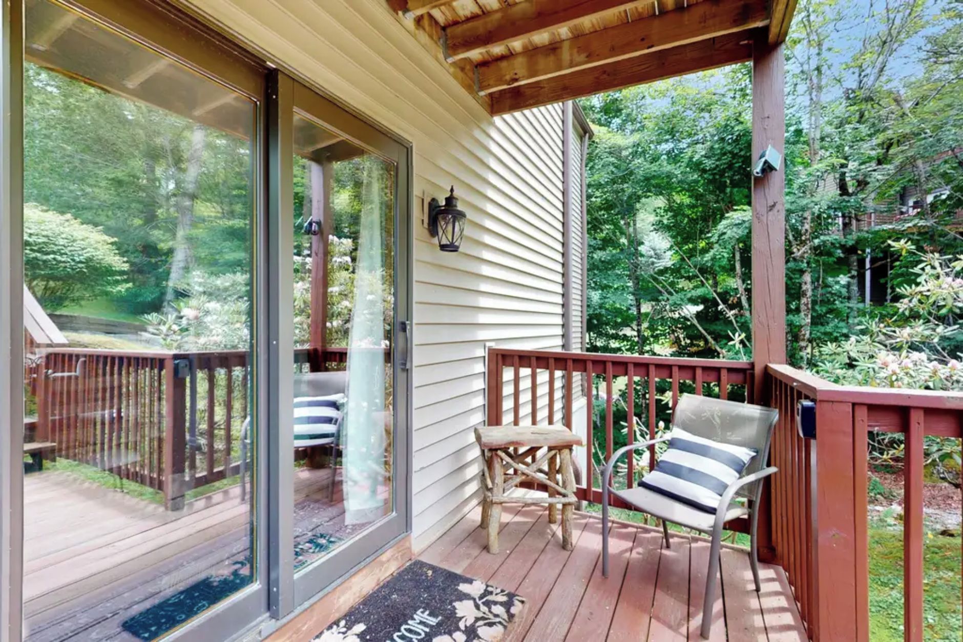 Step out onto your private balcony and sink into a cozy chair surrounded by lush forest greenery—your perfect spot for morning coffee or watching the trees sway in the breeze.