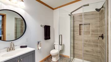 Shower, hair dryer, towels, shampoo