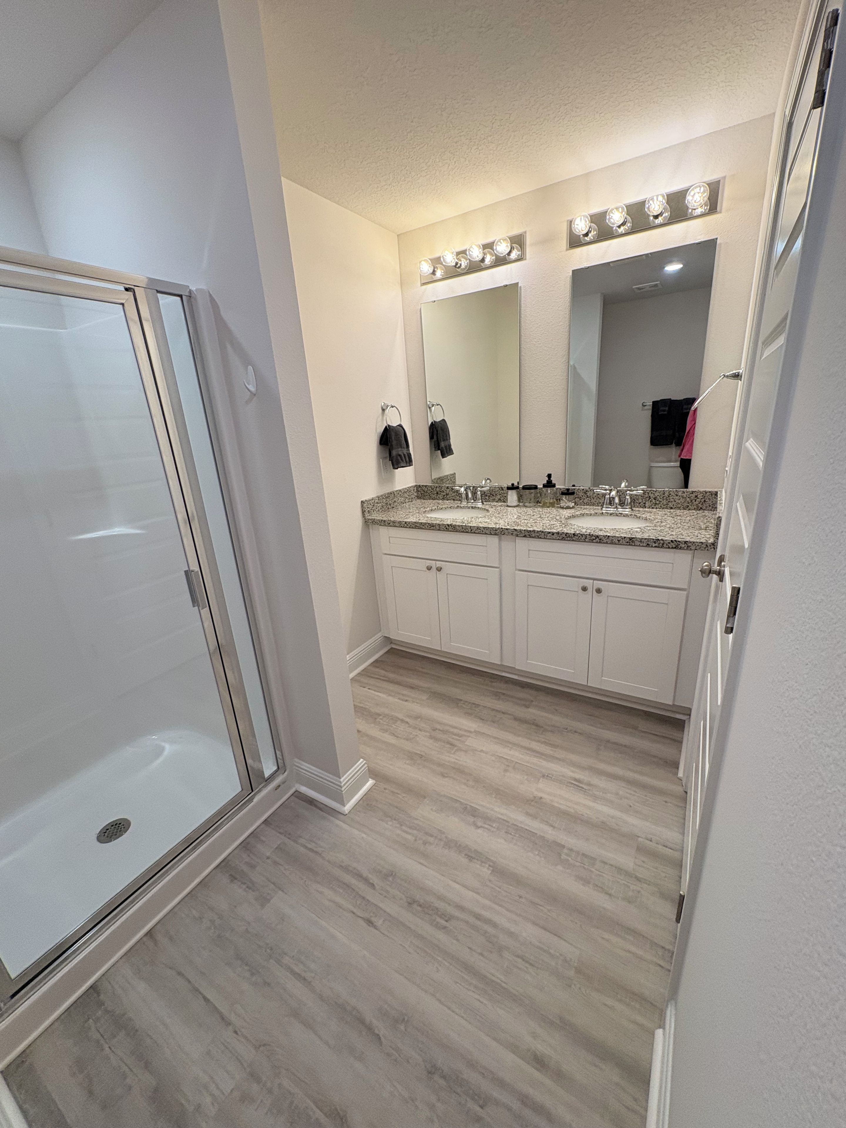 Shower, towels, soap, toilet paper