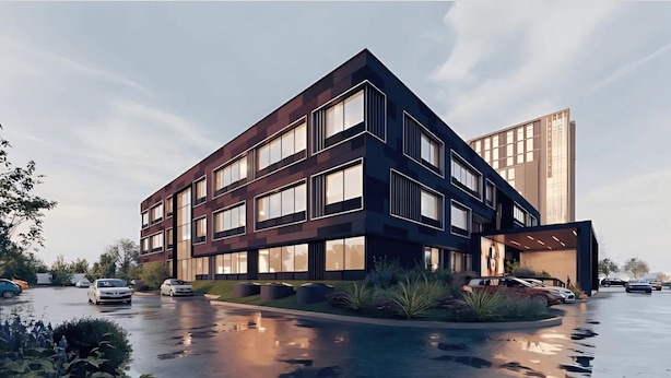 A modern building with multiple floors, large windows, and a parking lot with cars. - Aura Hotel & Suites  (Mississauga)