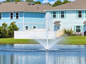 A residential building with a fountain in front. - Rae of Sunshine 3BR PCB Townhome, Sleeps 6, Great Family Getaway! (Panama City Beach)