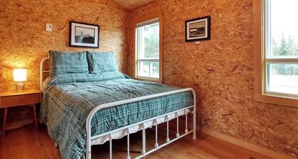 Chalet Baptiste | Rustic cottage nestled in the mountains on scenic Lac Unique