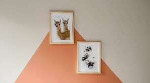 Two framed artworks on a wall with a geometric design. - Amanecer del Fuego VII (Ushuaia)
