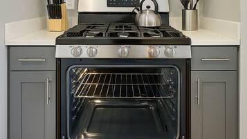 Coffee/tea maker, fridge, microwave, oven