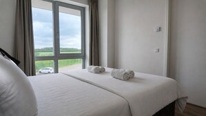 Room - Modern, fully equipped apartment with a spacious terrace overlooking the Oosterschelde. Suitable for four persons. (Scherpenisse)