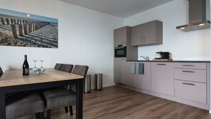 Dining - Modern, fully equipped apartment with a spacious terrace overlooking the Oosterschelde. Suitable for four persons. (Scherpenisse)