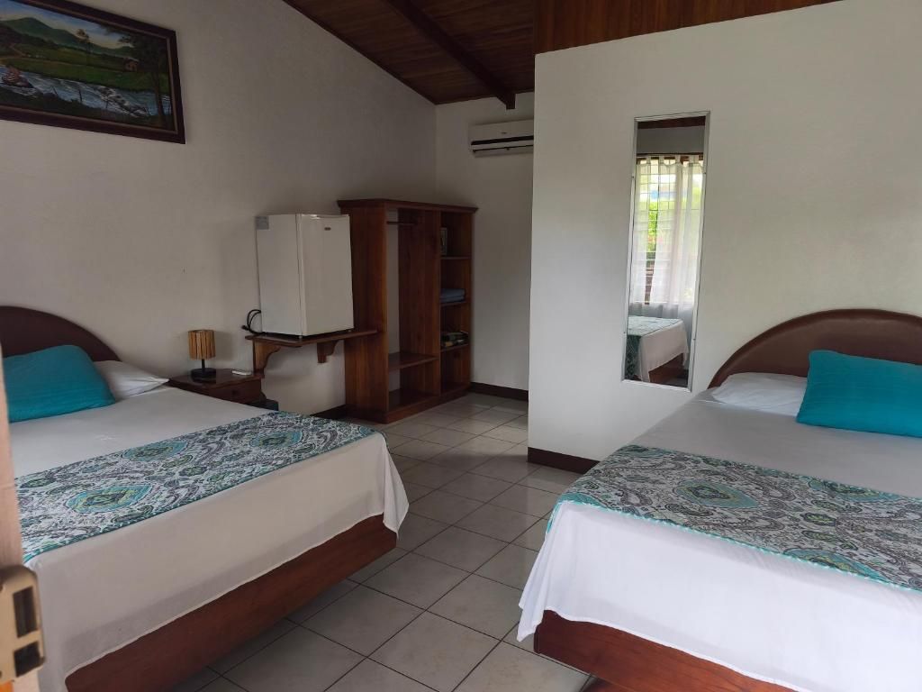 Standard Quadruple Room, Balcony, Courtyard View | In-room safe, free WiFi