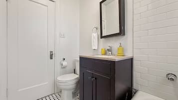 Shower, hair dryer, towels, shampoo