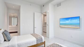 Iron/ironing board, travel crib, WiFi, bed sheets