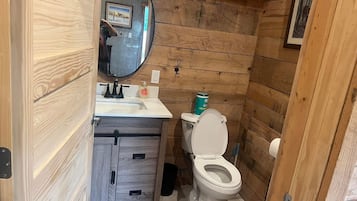 Shower, towels, soap, toilet paper