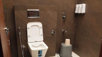 Ducha, artículos de tocador gratuitos, toallas, jabón