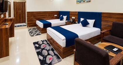 Spacious 11-bedroom hotel in charming Banbasa with AC