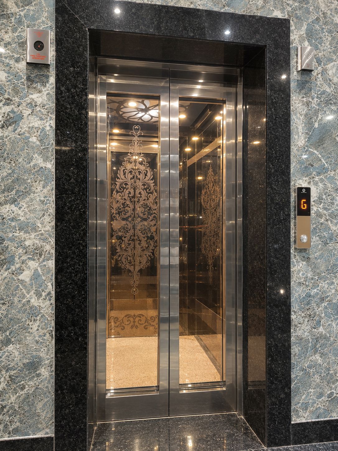 An elevator with a digital display showing the number 6, surrounded by marble walls.
