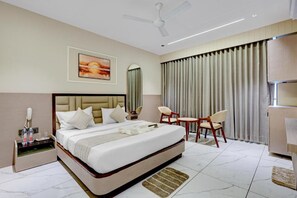 Deluxe Double Room, City View | Iron/ironing board (on request), WiFi (free) - Hotel Lee Fortune (Gandhi Nagar)