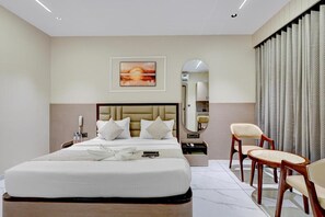 Deluxe Double Room, City View | Iron/ironing board (on request), WiFi (free) - Hotel Lee Fortune (Gandhi Nagar)