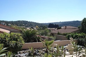 A residential area with houses, greenery, and a clear sky. - Holiday home in Armissan with swimming pool (Armissan)