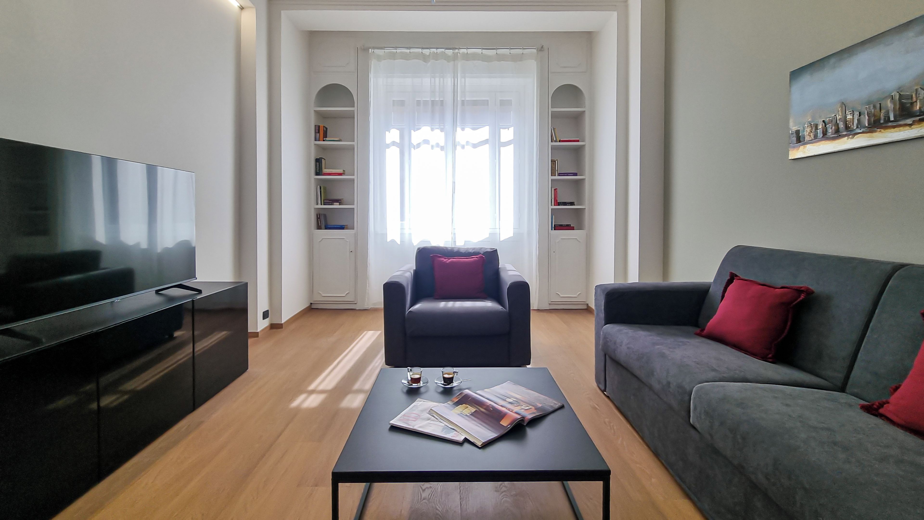 Apartment (2 Bedrooms) | Living area | 32-inch Smart TV with cable channels