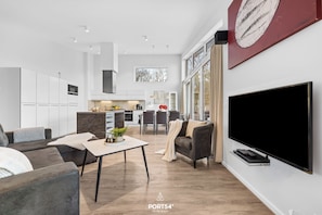 Living area - Exclusive Penthouse Apartment with Sauna and Balcony near Priwall Beach (Lübeck)