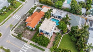 Aerial view showing property layout and surrounding neighborhood context - Tropical 1BR Casita w/ Shared Pool Access (West Palm Beach)