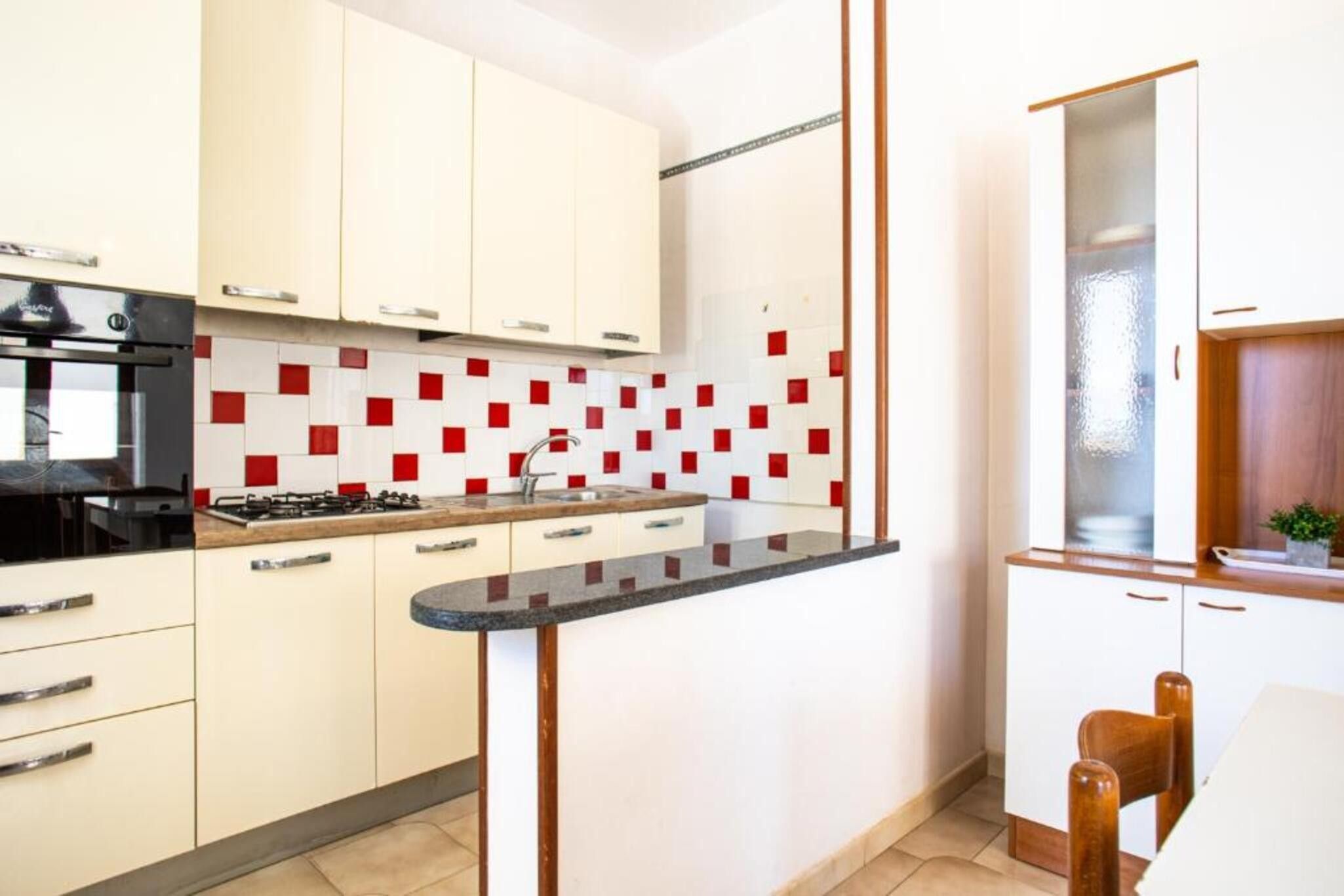 Fridge, stovetop, cookware/dishes/utensils