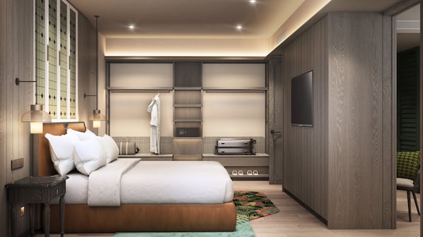 A modern hotel bedroom with a large bed, a wardrobe, a television, and a bathroom.