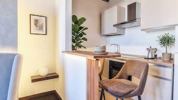 Estudio, vistas a la ciudad | Cocina privada