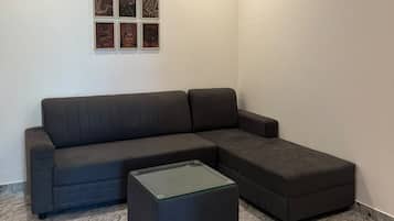 Habitación doble Deluxe | Área de sala de estar