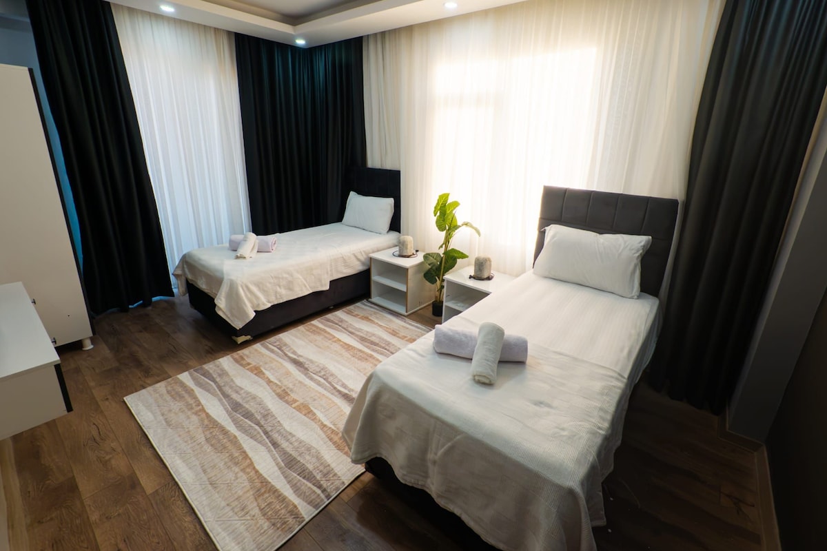 Premium bedding, down duvets, desk, laptop workspace