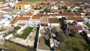 A residential area with houses, a cinema, and a church.