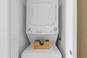 A white washing machine with a control panel and a basket for laundry. - 2BR Ocean View Balcony Pool (Hollywood)